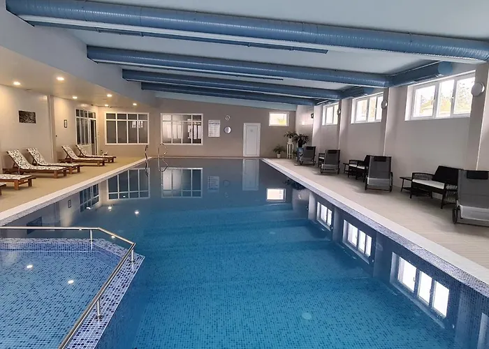 Отель Olympus Plaza - & Indoor Pool