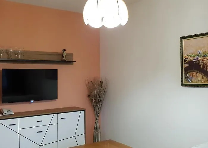 Olympus Plaza - & Indoor Pool Отель