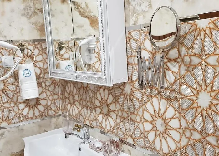 Olympus Plaza - & Indoor Pool Отель